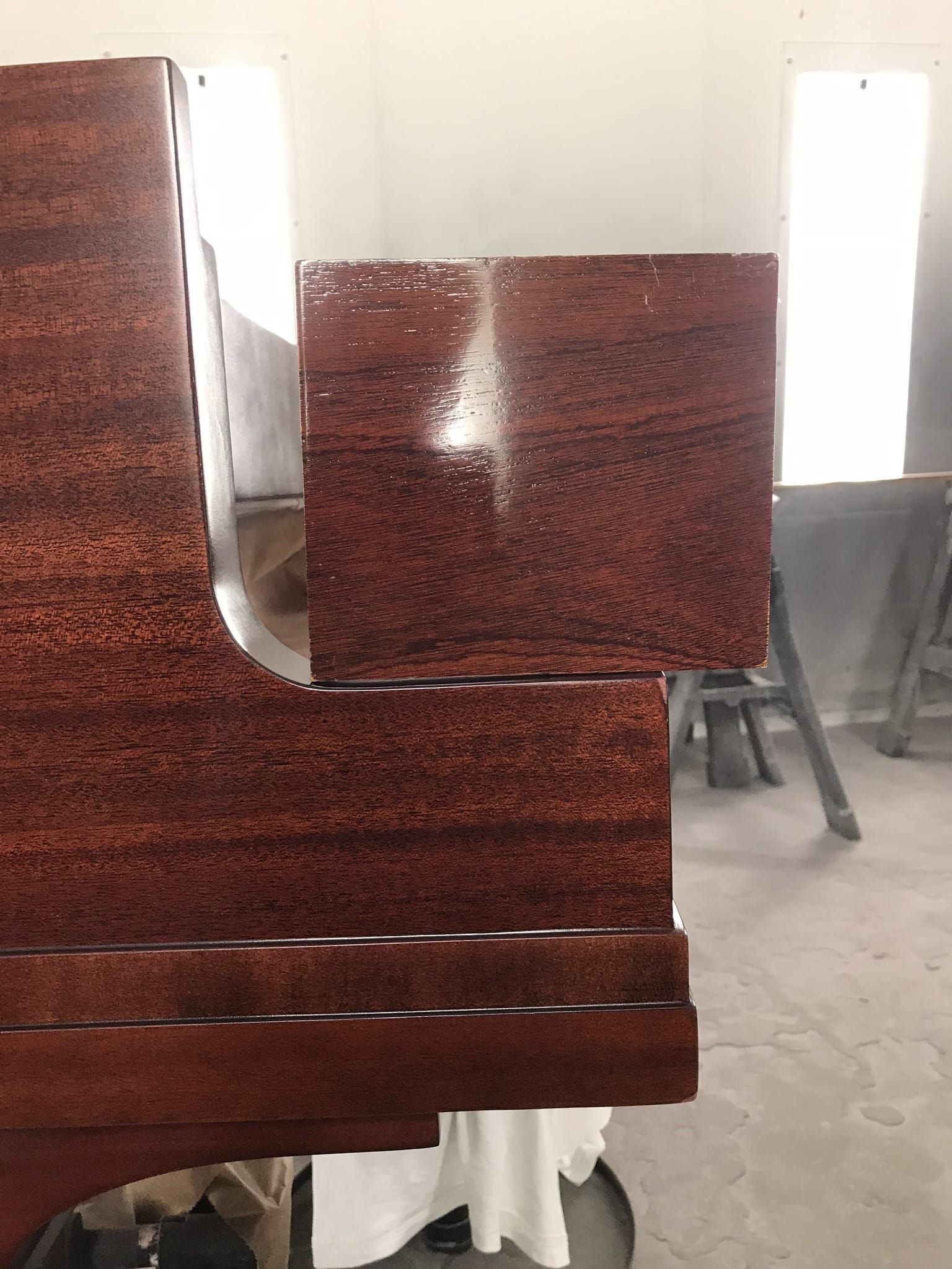 Close-up of mahogany piano case joinery